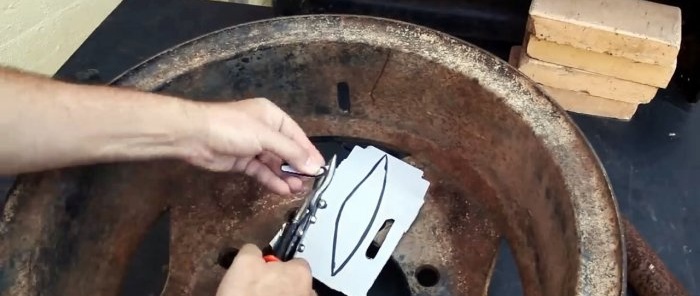 How to make a fire pit from an old wheel rim