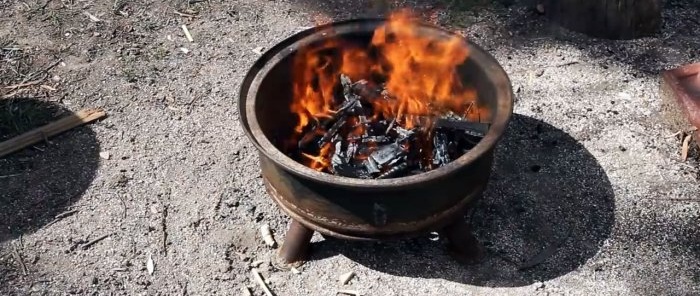 How to make a fire pit from an old wheel rim