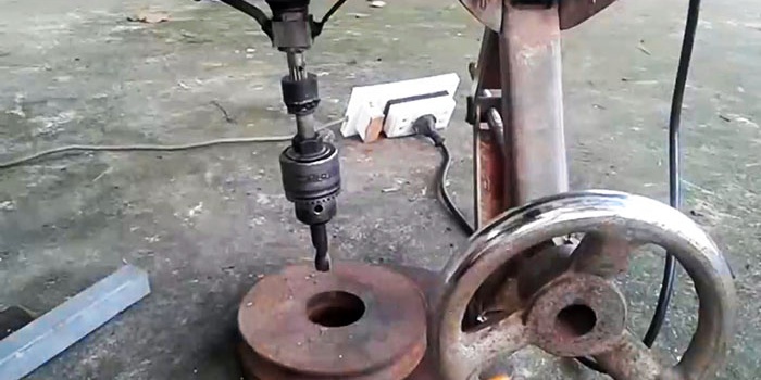 How to make a drilling machine from a jack and a washing machine motor