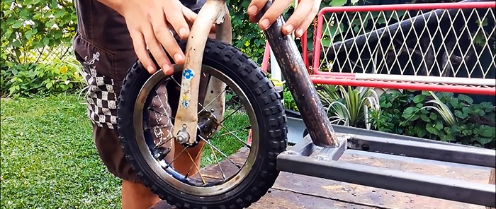 Scooter with a chainsaw engine and an angle grinder gearbox