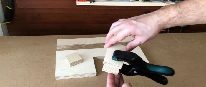 Homemade hand-held plywood band saw driven by a screwdriver