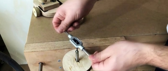 Homemade hand-held plywood band saw driven by a screwdriver