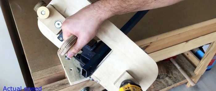 Homemade hand-held plywood band saw driven by a screwdriver