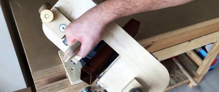 Homemade hand-held plywood band saw driven by a screwdriver