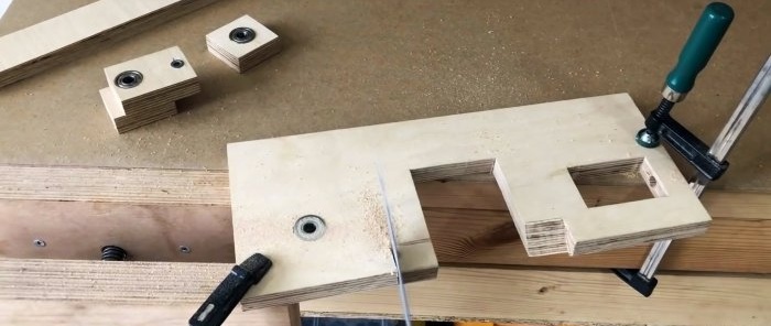 Homemade hand-held plywood band saw driven by a screwdriver