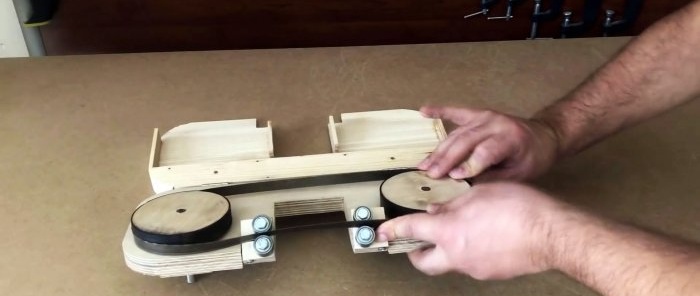 Homemade hand-held plywood band saw driven by a screwdriver