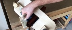 Homemade hand-held plywood band saw driven by a screwdriver