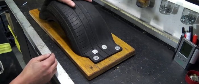 Making a wall-mounted compact boxing trainer from a tire