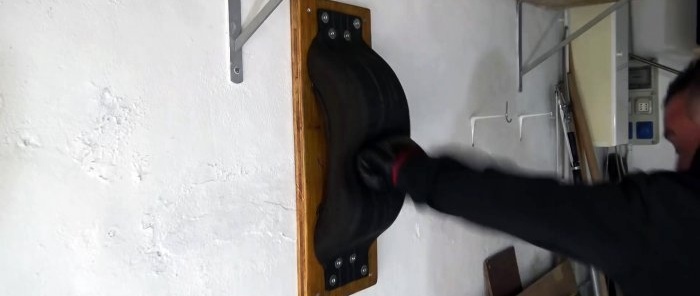 Making a wall-mounted compact boxing trainer from a tire