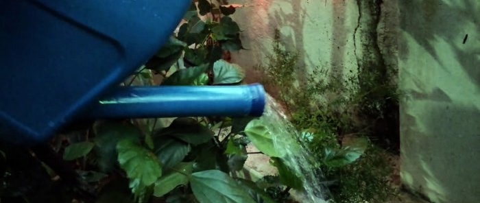 How to make a garden watering can from a canister and cutting a pipe