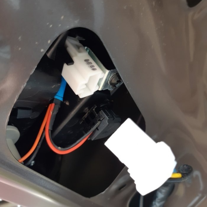 Eliminating condensation in car lights