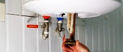 How to clean water heater heating elements from scale