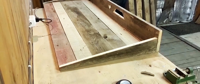 How to make a door to a bathhouse of an interesting design from old boards