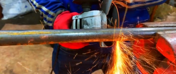 Stand for splitting firewood with a hammer from an old car wheel