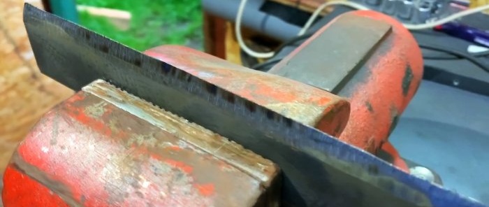 Stand for splitting firewood with a hammer from an old car wheel