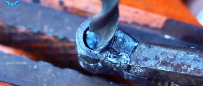 Manual hole punch for tin from broken pliers