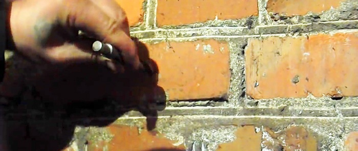 An old-fashioned way to make a hole without a hammer drill