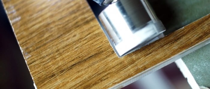 How to use a grinder to make a perfectly even square hole in a tile