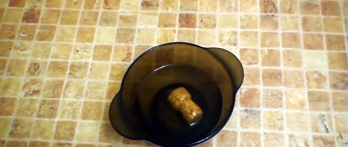 Place the champagne cork in a bowl of water