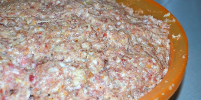 Add spices and knead the minced meat