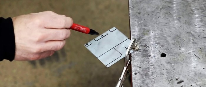 Marking a piece of tin