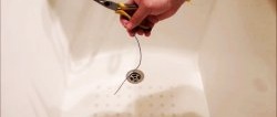 How to clean a bathroom drain with stranded wire