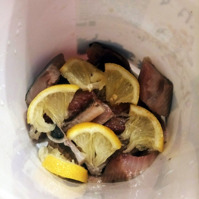 How to make preserved herring in lemon juice