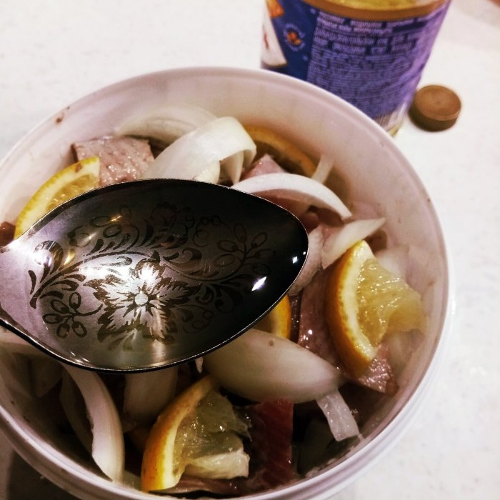 How to make preserved herring in lemon juice