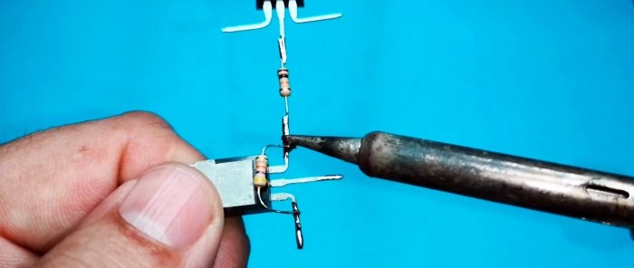 How to make a transistor switch to control a powerful load with a momentary button