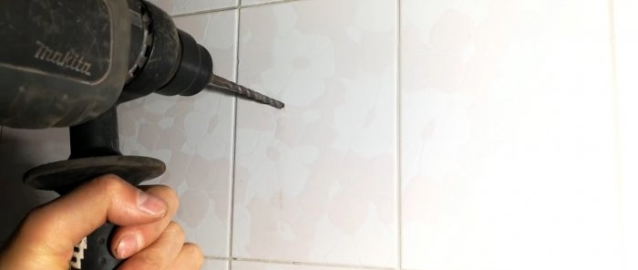 How to drill into tiles with a concrete drill so that it doesn't crack