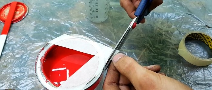 How to pour paint from a can without staining its edges or anything around it