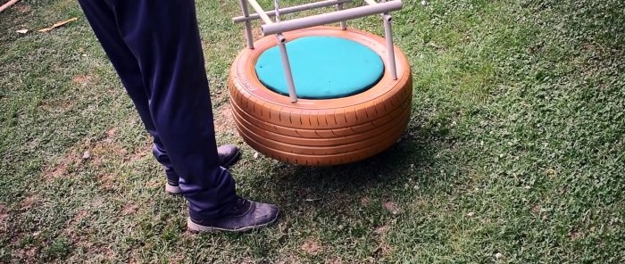 How to make an outdoor swing from an old tire and delight the kids