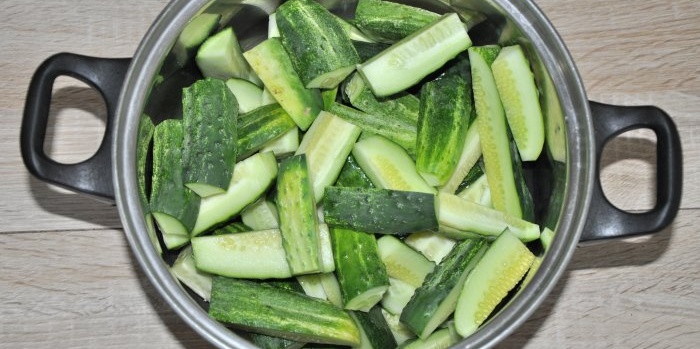 Instant lightly salted cucumbers in a saucepan