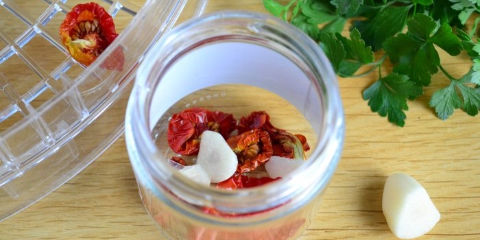 What to do with lots of tomatoes Make sun-dried tomatoes