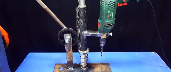 Simple chain and star driven drill stand