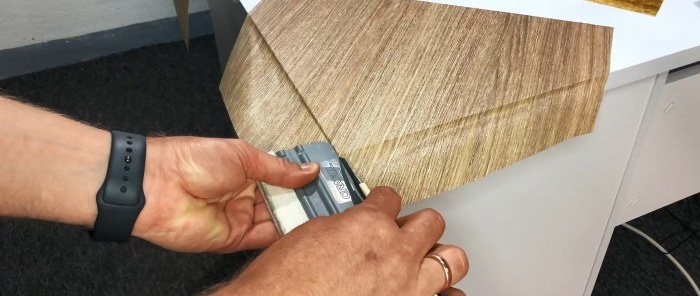 How to stick self-adhesive film on the corners and edges of furniture