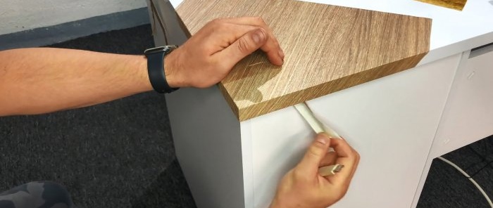 How to stick self-adhesive film on the corners and edges of furniture