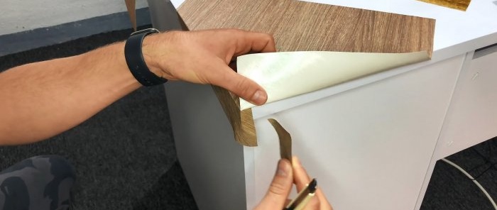 How to stick self-adhesive film on the corners and edges of furniture