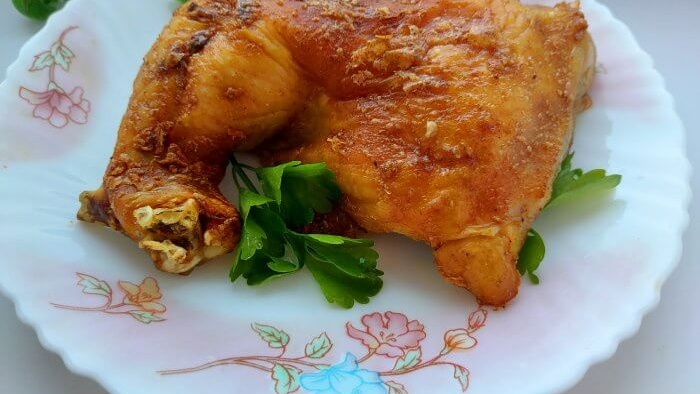 Chicken cooked on a wire rack in the oven An underrated recipe for crispy skin