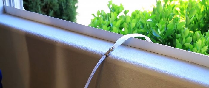 How to run a TV cable from the street through a window without drilling