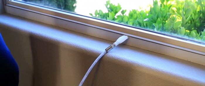 How to run a TV cable from the street through a window without drilling