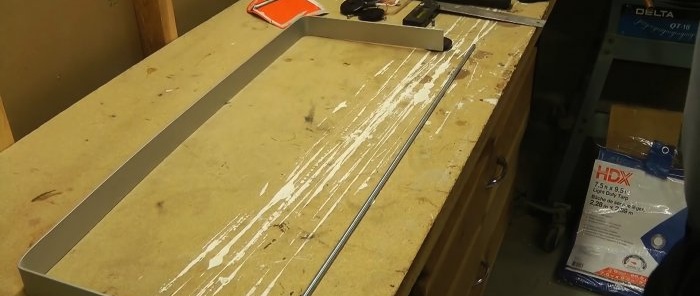 How to make a tool for quickly removing snow from the roof without climbing onto the roof