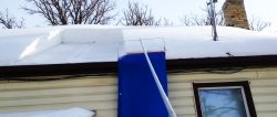 How to make a tool for quickly removing snow from the roof, without climbing onto the roof