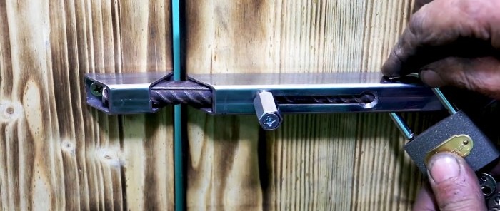 The simplest door bolt made from a piece of profile and fittings