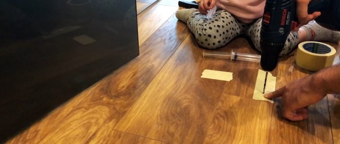 How to remove creaking laminate flooring without disassembling it