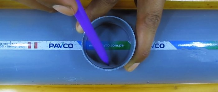 How to glue a thin PVC pipe into a large one without a tee