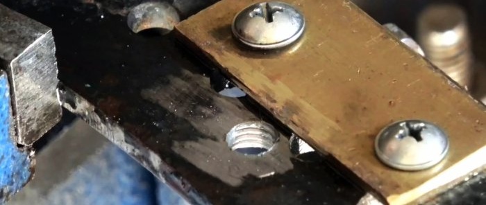 Two in one: how to make a belt grinder and polishing machine from a washing machine motor and an old shock absorber