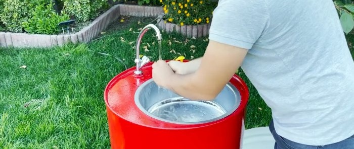 How to make a convenient and attractive garden sink from a metal barrel