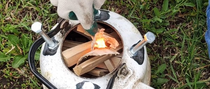 Great idea on how to make a portable stove out of an old kettle