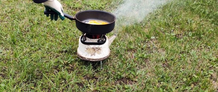 Great idea on how to make a portable stove out of an old kettle